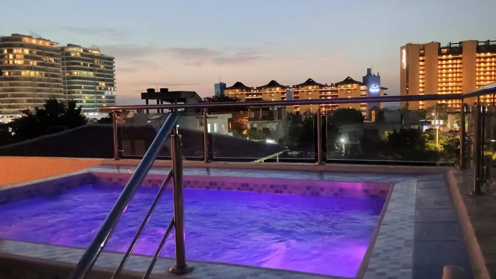 Encanto Apartahotel Sunset contacts